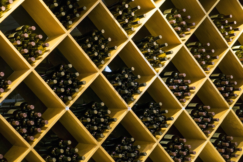 container, shelf, lot, wine cellar, bottle, refreshment, abundance, choice, large group of objects, winemaking, alcohol, luxury, wine bottle, bottles, bottle rack