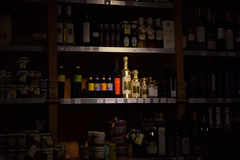 large group of objects, drink, bottle, shelf, wine, order, arrangement, mood, collection, wine bottle, abundance, music, liquor store, choice, sale, lighting