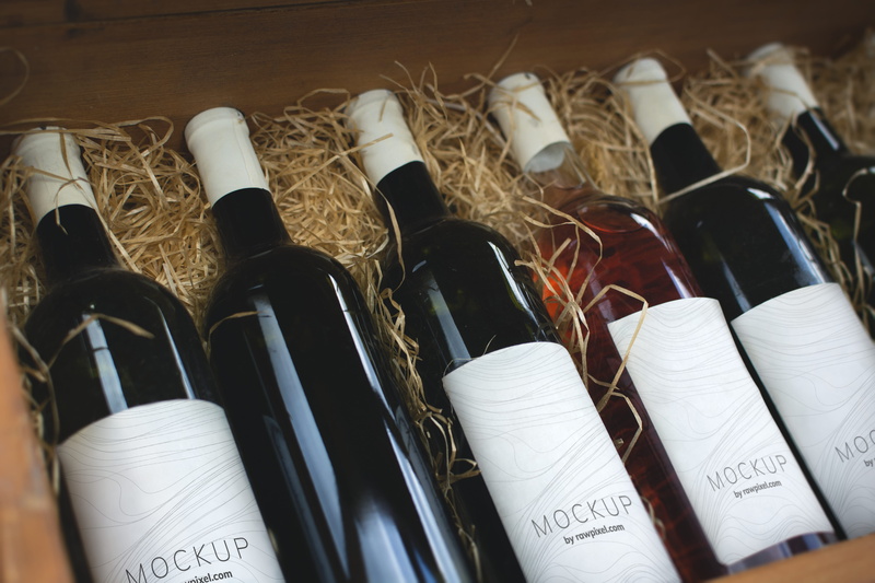 indoors, large group of objects, paper, menswear, variation, winery, traditional, retail, alcohol, mock up, wine bottles, row, business, bottles, high angle view