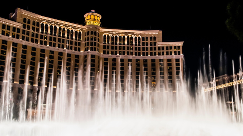 the past, long exposure, history, night, hotel, tourism, low angle view, bellagio, travel destinations, motion, fountain, usa, architecture, illuminated