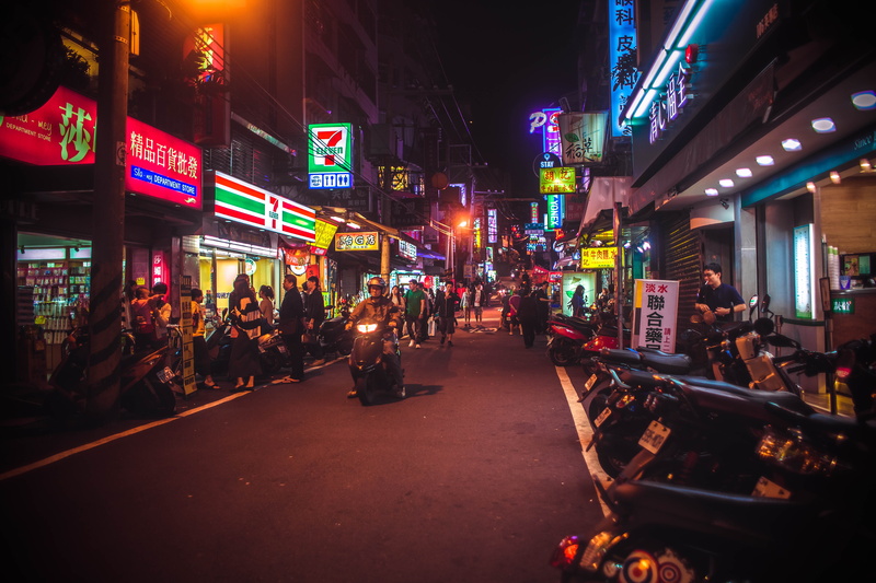 market, illuminated, vehicle, men, large group of people, town, bar counter, leisure activity, architecture, building exterior, 5K, motorcycle, adult