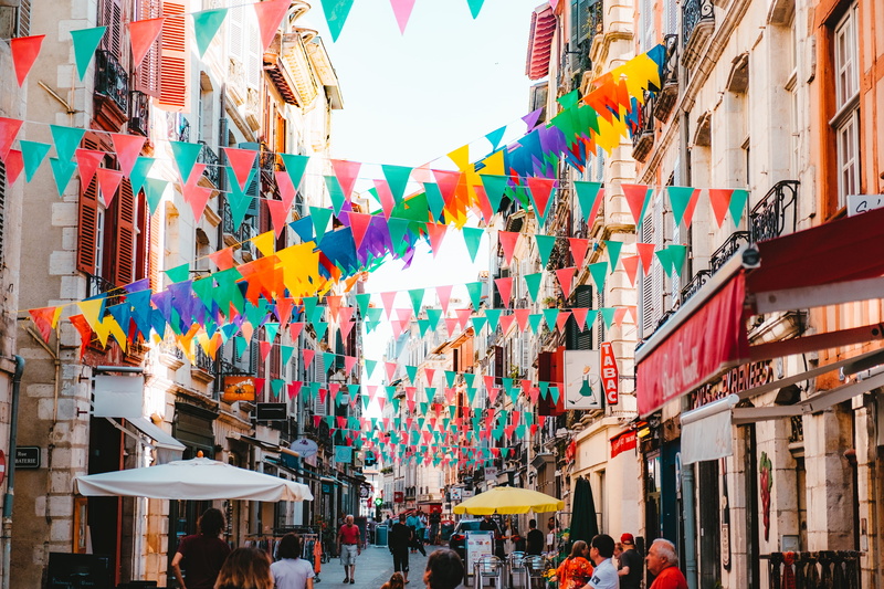 road, downtown, building exterior, photo, large group of people, buildings, shop, assorted, walking, umbrella, person, bazaar, real people, daytime, bayonne