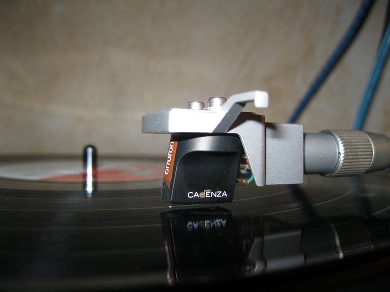 playback device, analog, black color, focus on foreground, technology, indoors, audio device, tinge, vinyl, system, sound recording equipment, communication