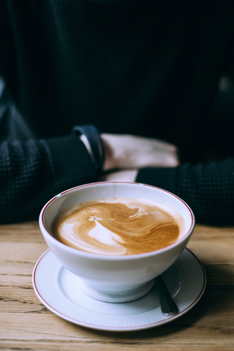 saucer, brown, liquid, ceramic, hot drink, cacao, table, spoon, scandinavia, drinks, drink, cafe, eating utensil, coffee cup, milk, pottery, coffee - drink