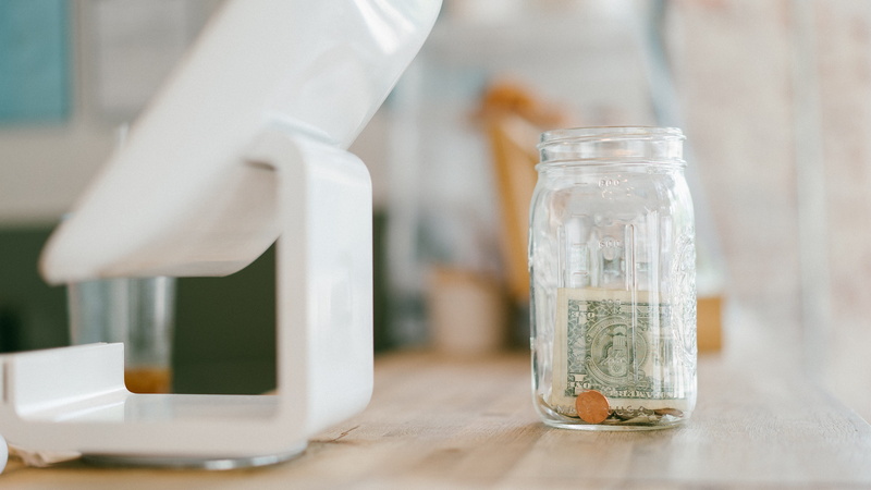 dollar, jar, ipod, wood - Material, laboratory, business, science, cafe, medicine, money, finance, surface, people, penny, hospital, restaurant, till, close-up