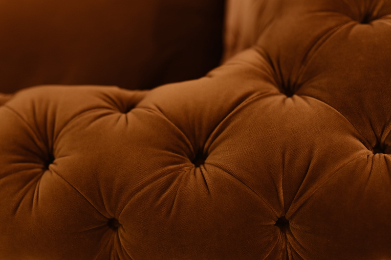 luxury, close-up, comfortable, sofa, adult, brown, lying down, studio shot, leather, black background, couch, cozy, relaxation, modern, cosy, indoors, orange