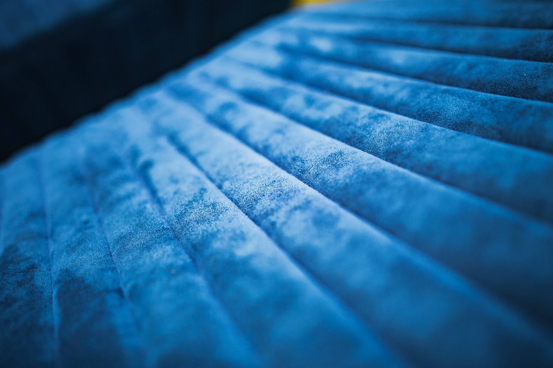 indoors, group of objects, no People, textured, staircase, industry, business, extreme close-up, Soft, blue, selective focus, full frame, sofa, architecture
