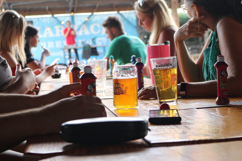 togetherness, food and drink, pub, bar, 5K, performance, music, men, restaurant, wooden table, glass, group, people, drinking glasses, day, refreshment
