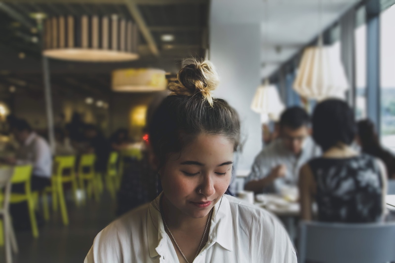 real people, child, incidental people, looking, lifestyles, focus on foreground, women, 4K, hairstyle, female, food, contemplation, restaurant, behind