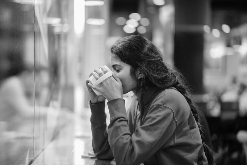 glass, hot beverage, bokeh, woman, business, cup, grayscale, drink, café, table, portrait, coffee cup, adult, sadness, monochrome, 8K, focus, sweater