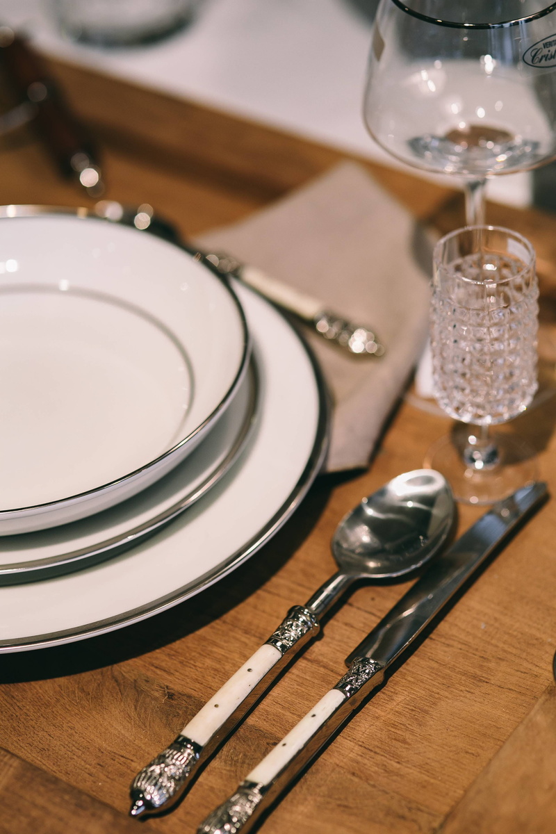 wood - material, indoors, high angle view, tablecloth, Fancy, plate, arts culture and entertainment, elegance, still life, setting, wineglass, feathers