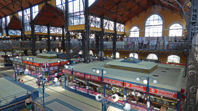 city life, real people, consumerism, indoors, mode of transportation, ceiling, transportation, building, day, market, store, city, crowd, large group of people