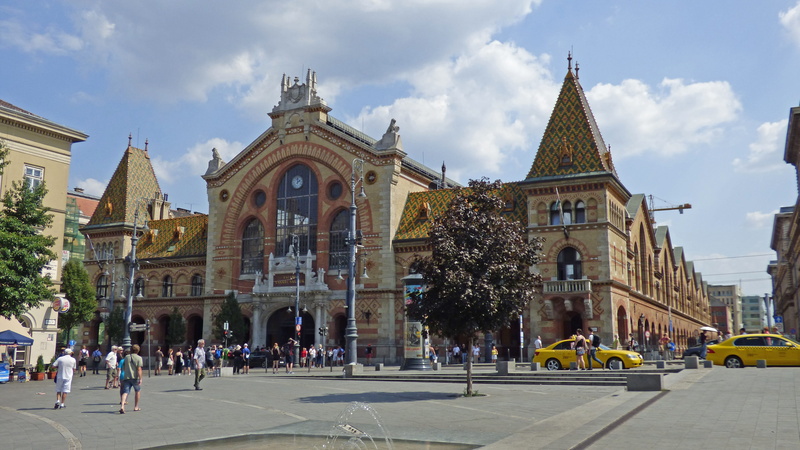 great market hall, city, sky, built structure, mode of transportation, place of worship, spire, crowd, travel destinations, cloud - sky, street, nature