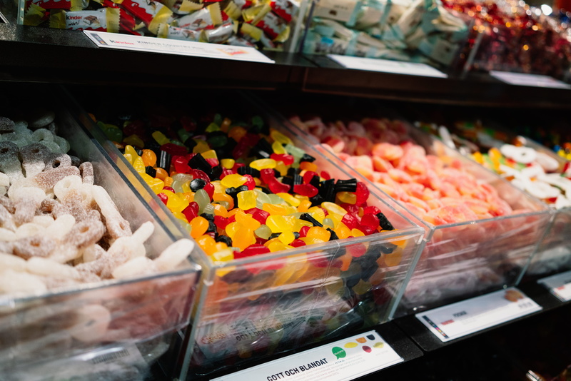retail display, display cabinet, freshness, restaurant, shelf, sweets, abundance, retail, sweet, 8K, candies, food and drink, creme, cushion, arrangement