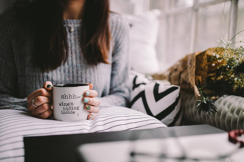 hot drink, coffee - Drink, bed, text, resting, time, real people, one Woman Only, people, one Person, lifestyles, front view, food and drink, sitting, cup