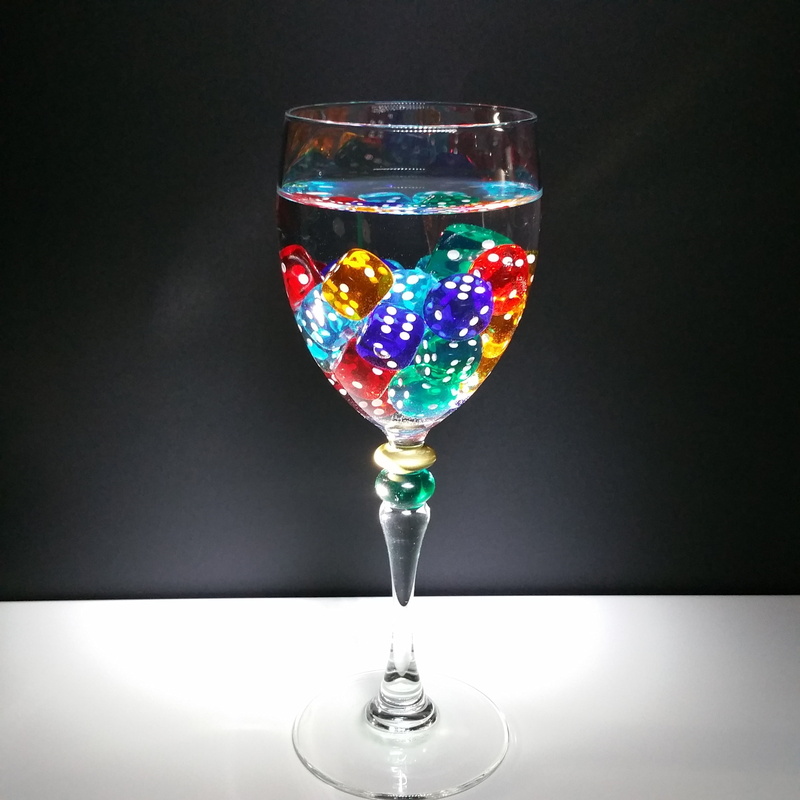 no people, food and drink, gray, multi colored, glass, drinking glass, wine glass, drink, household equipment, wineglass, lucky dice, refreshment, colorful