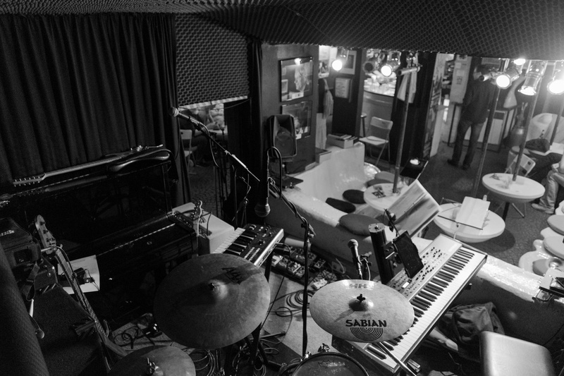 guitar, keyboard, curtain, artists, bass, live concert, indoors, high angle view, black and white, lighting, musical instrument string, live, studio, fans