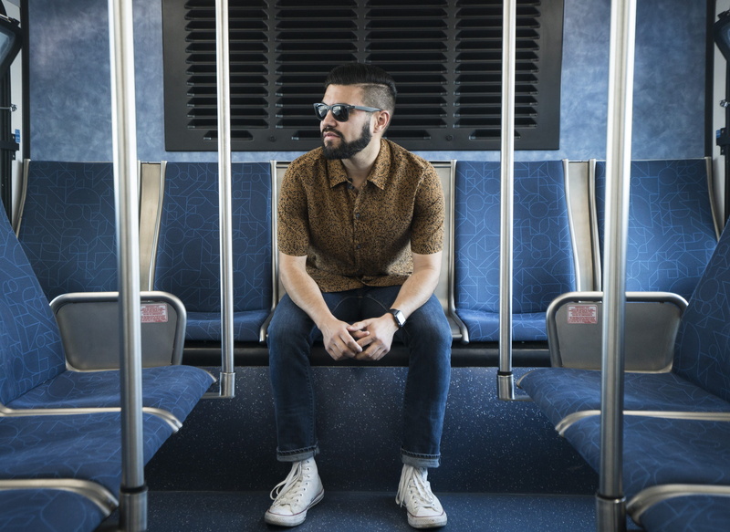 people, person, looking, men, real people, indoors, young men, front view, leisure activity, sunglasses, human, one person, public transit, young adult