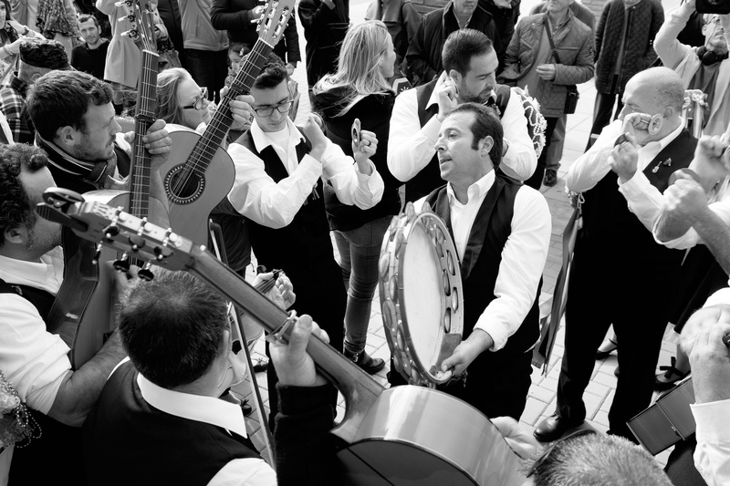 drum - percussion instrument, playing, celebration, human arm, string instrument, skill, quinoal, performance, musician, group of people, cante, fiestero