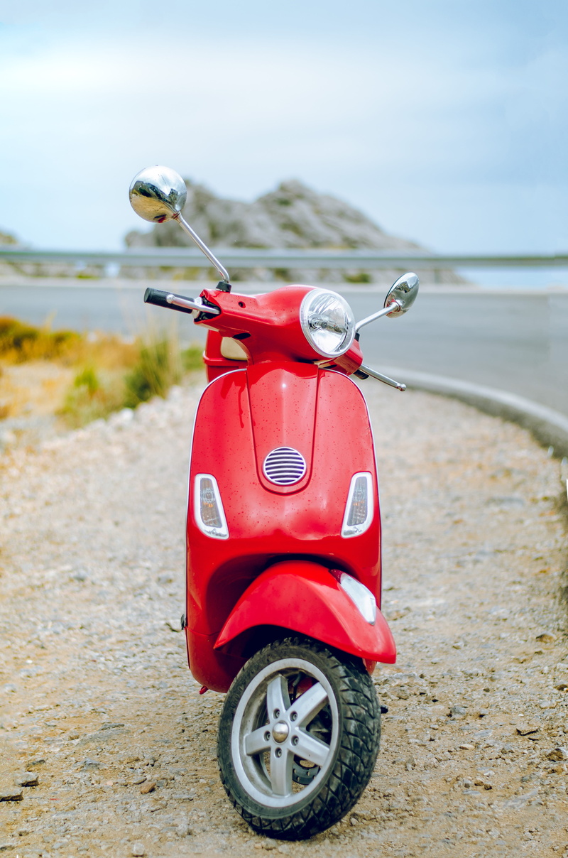 focus on foreground, body, near, scooter, wheel, side, daytime, beach, small, sea, red, 4K, vespa, no people, sky, mode of transportation, close-up, outdoors
