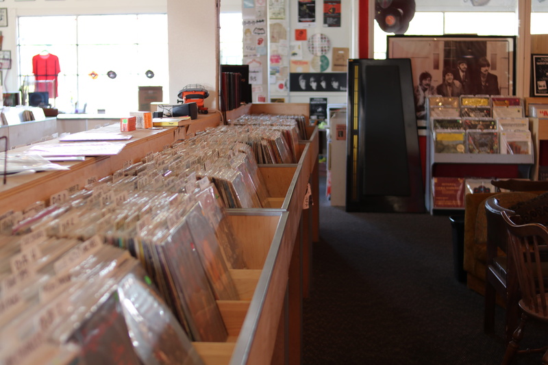 occupation, food and drink, indoors, seat, music, records, container, united states, 5K, musical, table, men, tower district records, tower, store, real people