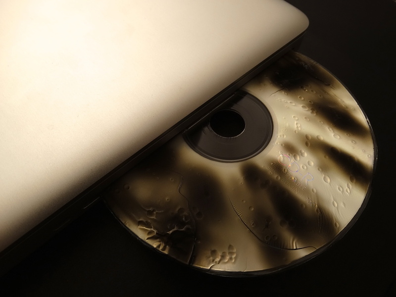 black, burn, record, metal, brown, retro styled, no people, technology, camouflage paint, high angle view, laptop, cd, water, compact disc, 2K, close-up
