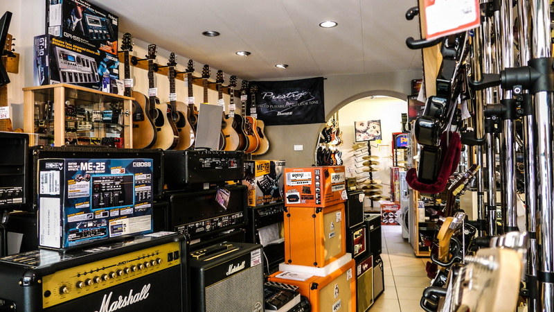 no people, large group of objects, ceiling, 2K, communication, music, shopping, indoors, illuminated, rock, arts culture and entertainment, instrument