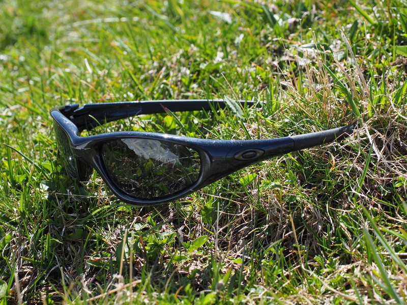 sun protection, single object, grass, nature, 4K, green color, summer, land, abandoned, growth, glasses, close-up, personal accessory, plant, oakley, focus on foreground