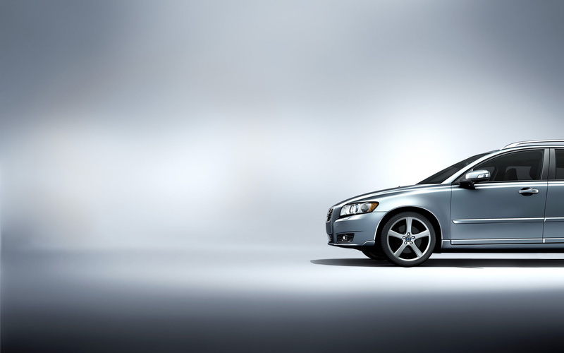 car Dealership, background, mode of transportation, studio shot, indoors, v50, suv, focus on foreground, technology, reflection, transportation, street