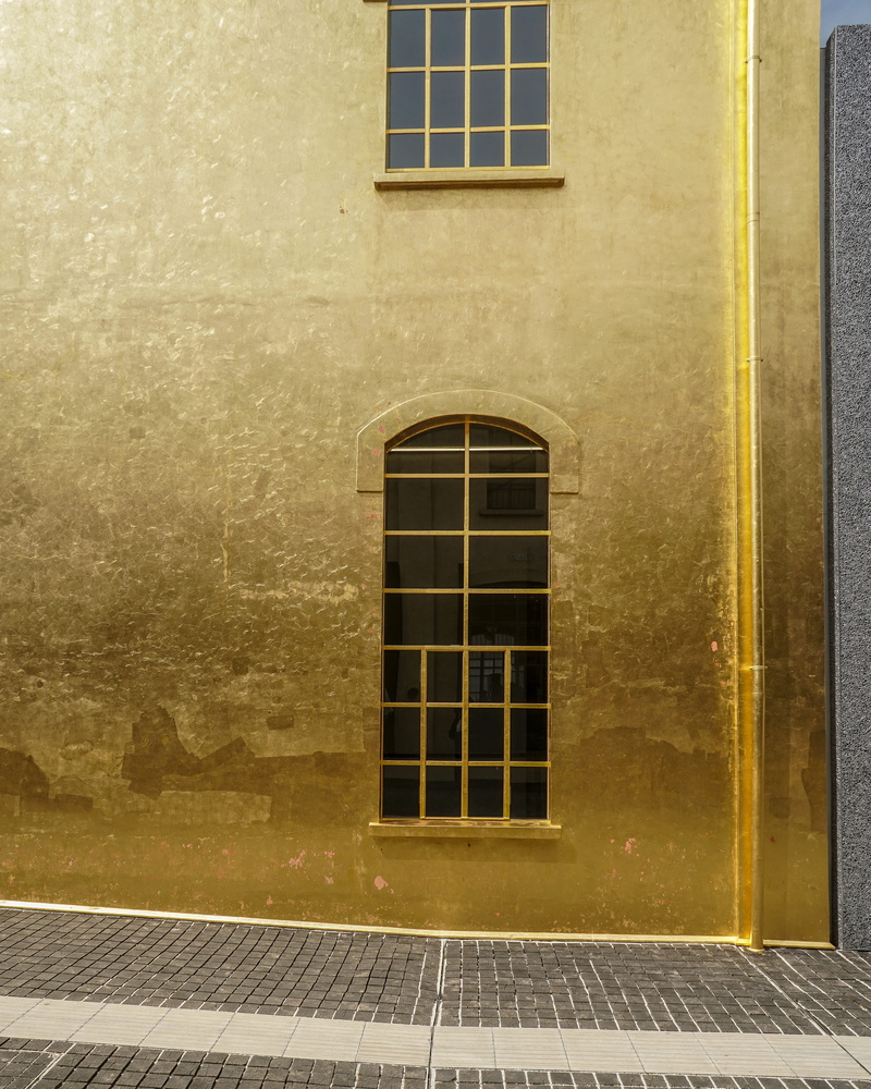 sunlight, prada fondazione, sidewalk, no people, italy, gold, building, reflection, yellow, nature, path, oma, window, city, prada, light, gold house, door