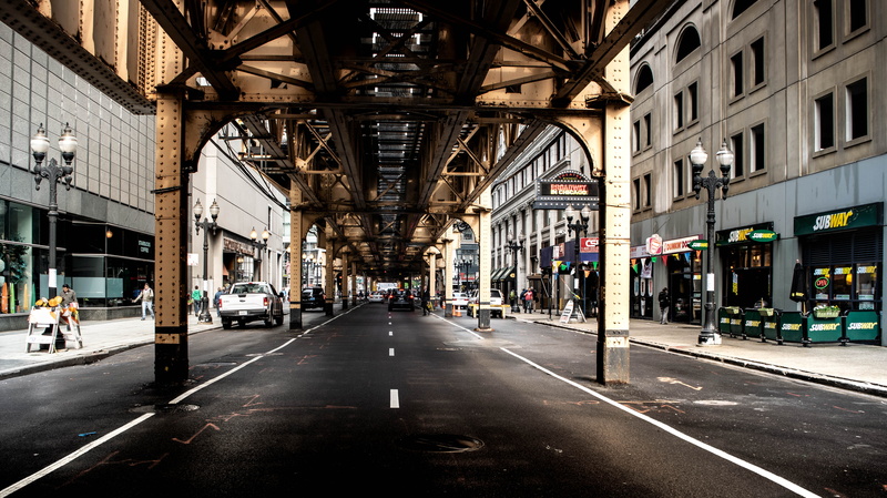 city view, incidental people, stores, car, building exterior, modern, road marking, architecture, vehicles, city life, traffic, the way forward, public