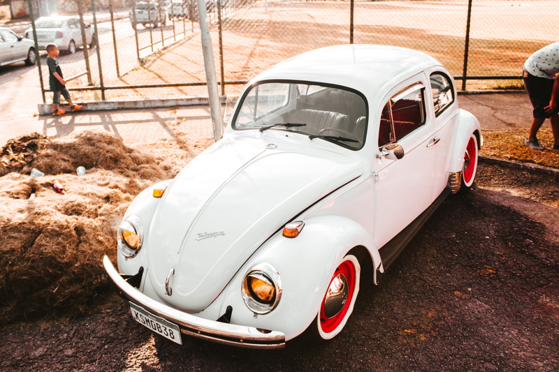 tire, machine, alloy wheel, volkswagen, spoke, person, retro styled, no people, transportation, sports car, white, beetle, hot rod, outdoors, car, abandoned