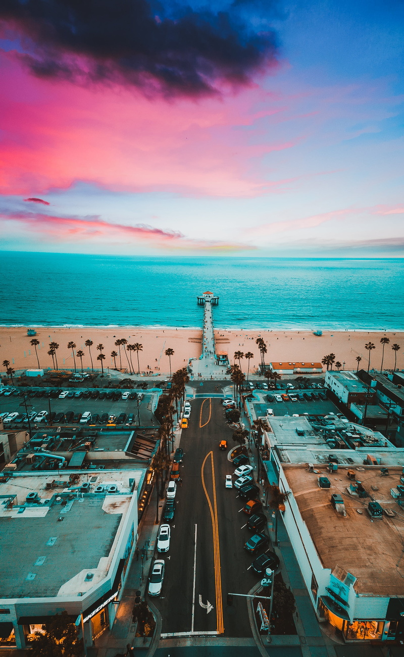 nautical vessel, water, pier, aerial, city, land vehicle, architecture, dock, motor vehicle, outdoors, manhattan beach, color, skyline, mode of transportation