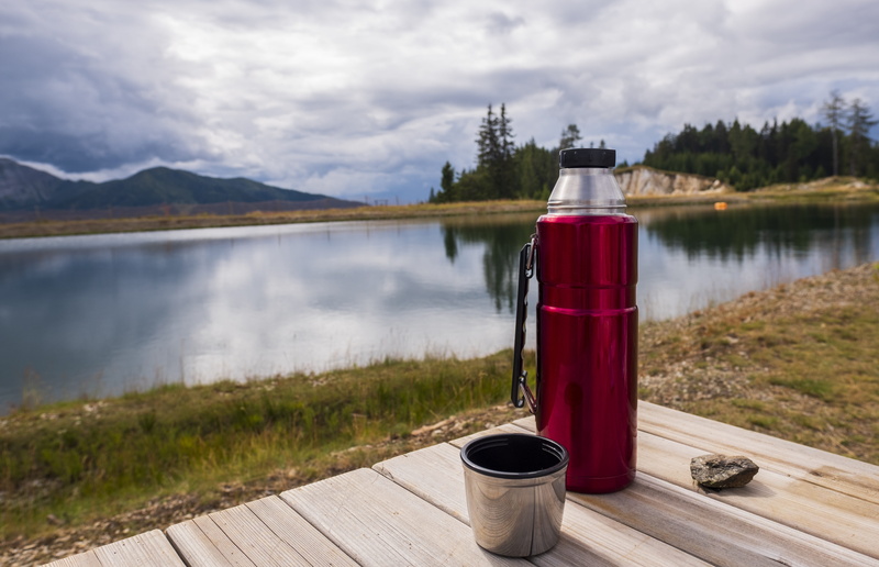 wood - material, jug, tee, no people, coffee, hiking, red, table, 5K, vascular, outdoors, mountain range, hot, plant, day, sky, mountains, tranquility