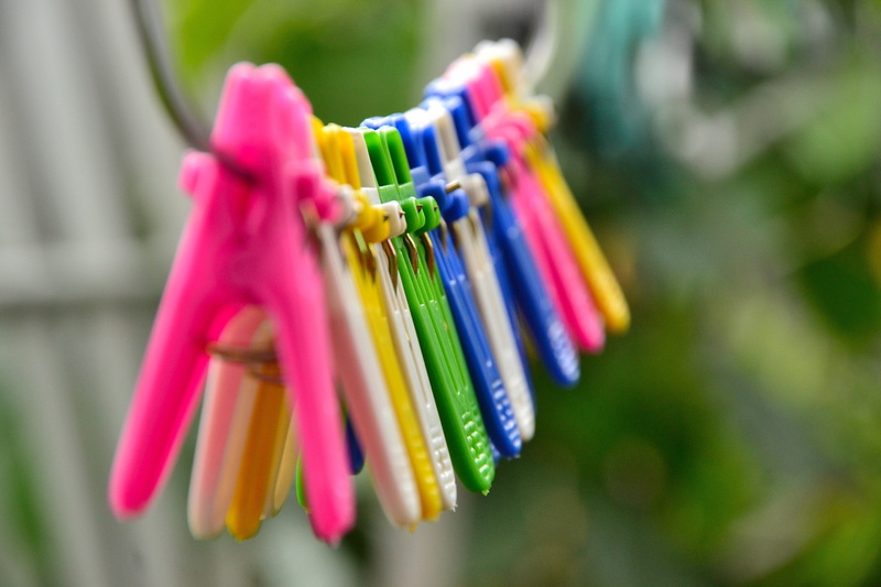 no people, large group of objects, interior, day, wear, business, close-up, blue, variation, selective focus, clothesline, clothes, group of objects, boutique