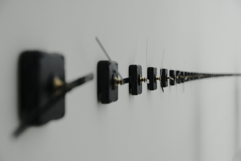 no people, clothing, in a row, white background, selective focus, apparel, domino, sphere, coat hook, indoors, studio shot, footwear, connection, close-up