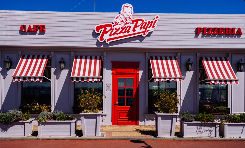 patriotism, canopy, sunlight, café, sochifornia, communication, vase, door, person, sky, red, pizza, architecture, россия, house, jar, white, pottery, window