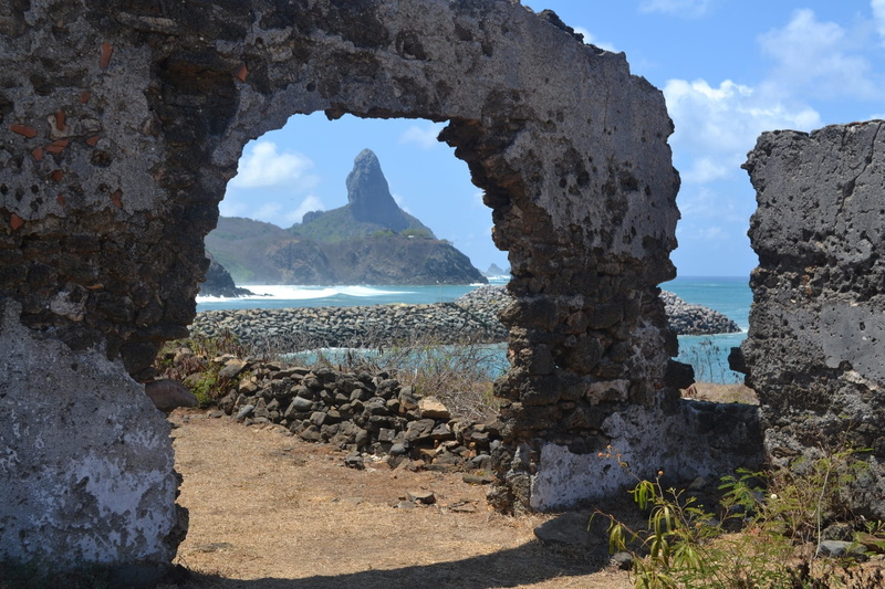 no people, pernambuco, day, non-urban scene, tranquil scene, tranquility, stack rock, solid, cloud - sky, natural arch, land, rock, sea, outdoors, noronha