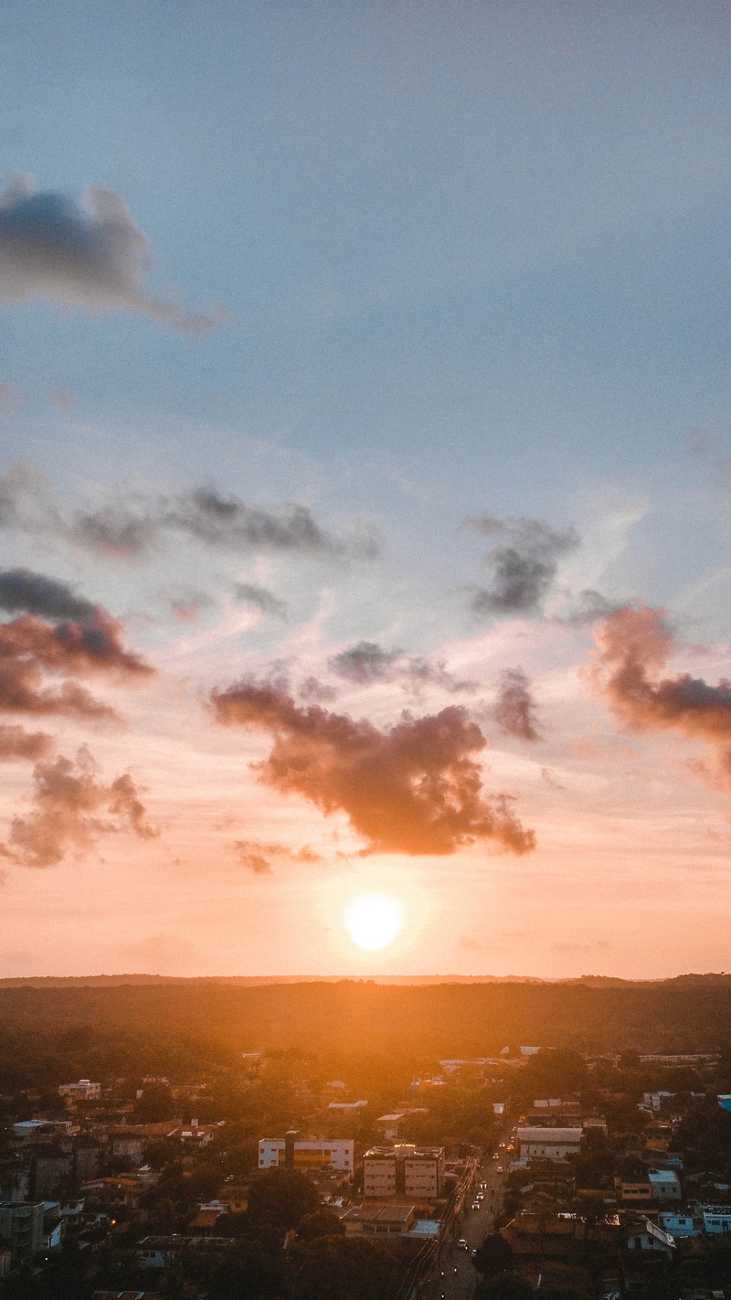 beauty in nature, horizon, sunrise, tranquility, building, school, top, environment, sunset, romantic sky, cloud - sky, sun, built structure, scenics - nature