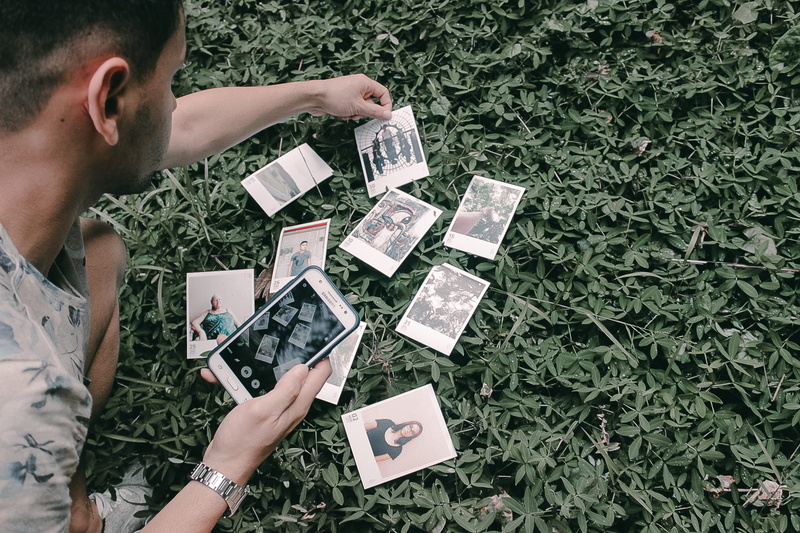 high angle view, currency, green color, 2K, outdoors, recife, day, brazil, men, lifestyles, young adult, young men, paper, directly above, holding, plant