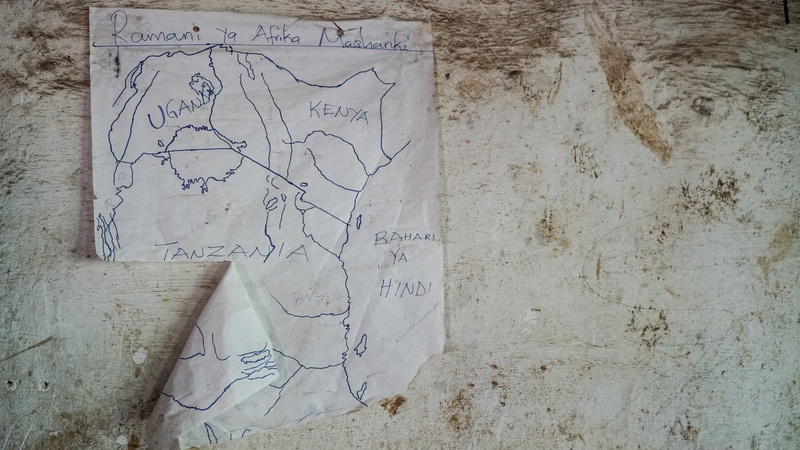 messy, ruined, handwriting, wall, indoors, text, creativity, art and craft, built structure, calligraphy, western script, map, bad condition, furniture