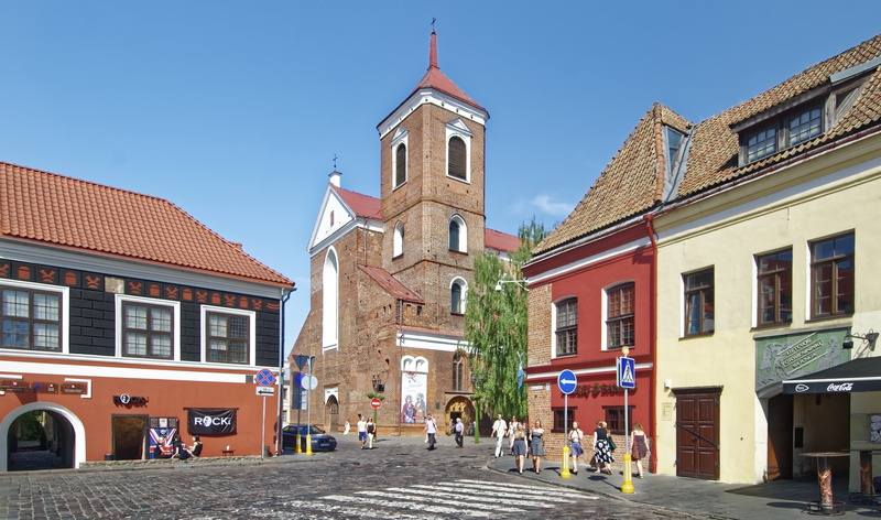 religion, church, city, street, cathedral of st peter and paul, outdoors, historically, building, town hall square, clear sky, belief, the past, incidental people