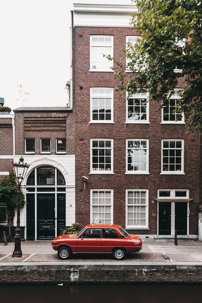daytime, retro, vintage, amsterdam, facade, built Structure, building Exterior, red, tree, waterway, window, car, retro Styled, mode of Transport, cityscape