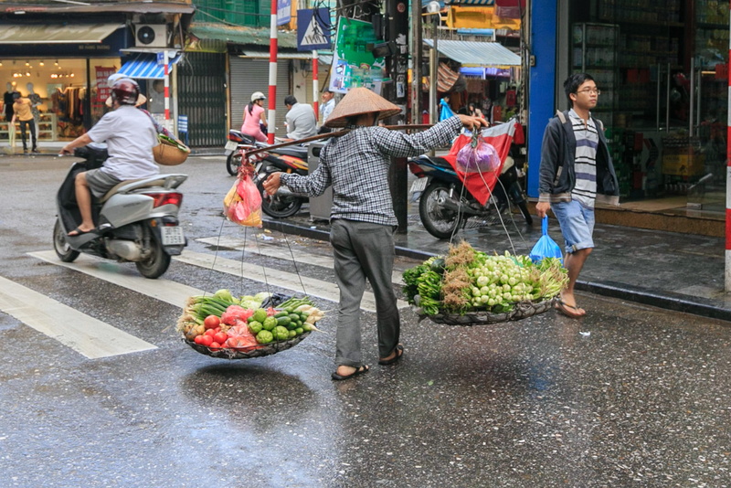 adult, retail, marketplace, person, outdoors, market, urban, stock, stores, vendor, mode of transportation, merchant, day, road, daylight, vegetables, street