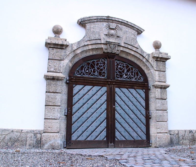 sky, wood doors, building exterior, double door, architectural style, ornate, pattern, round arch, arch, outdoors, door, nature, ancient times, metal fitting