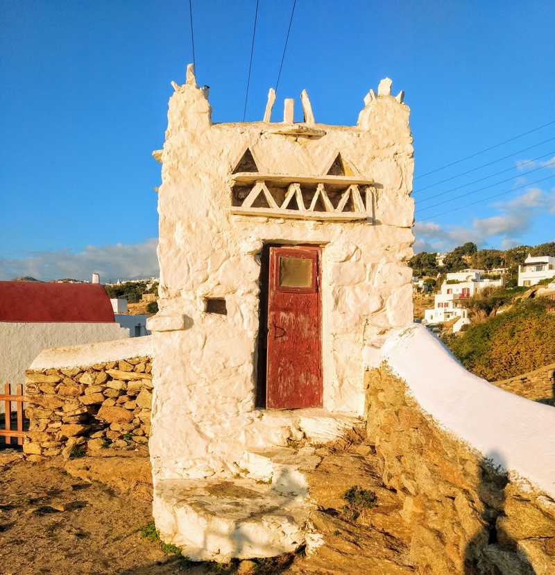 red door, mikonos, day, outdoors, mykonos greece, building, landscape, sunlight, religion, the past, ancient civilization, mykonos, building exterior, door