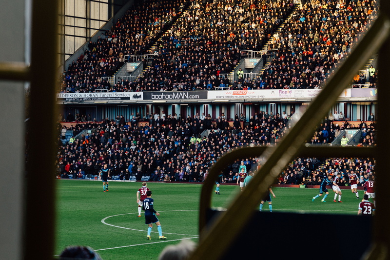 playing, game, men, competition, high angle view, daytime, match - sport, stadium, team sport, real people, sport, soccer field, focus on background, tv