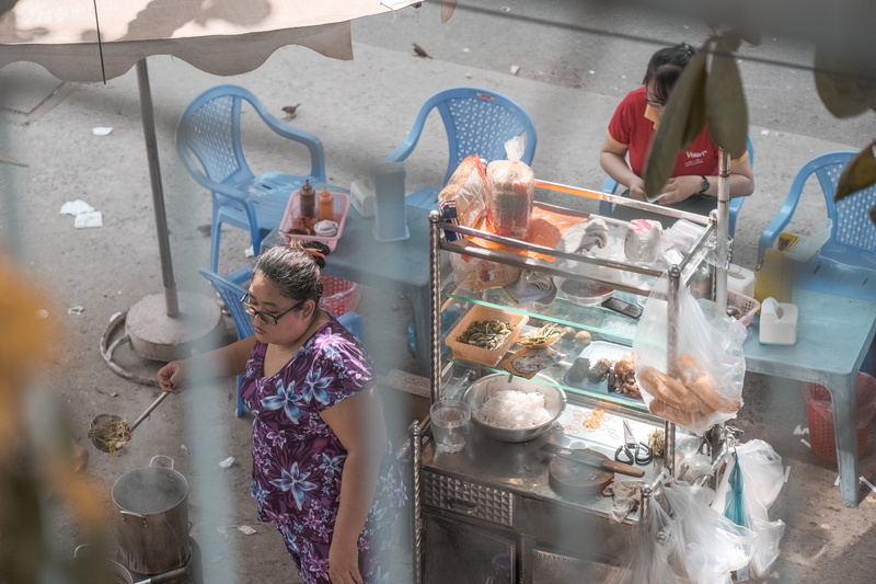 vietnam food, retail, chair, shop, retail display, furniture, clothing, shelf, high angle view, meal, cafeteria, standing, burger, casual clothing, one person