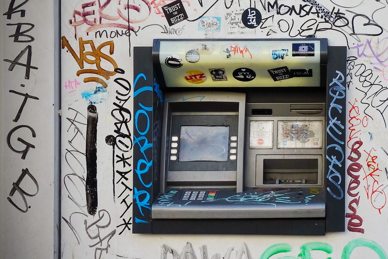indoors, communication, wall - building feature, industry, computer, business, glass - material, atm, finance, wall, vandalism, choice, connection, technology