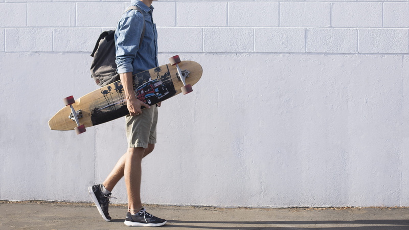 longboard, leisure activity, architecture, wear, street, young adult, casual, style, men, jeans, motion, blue, adult, caucasian, fashion, day, male, person